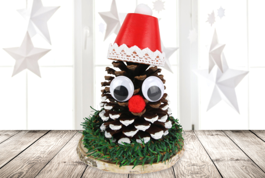 père noël avec une pomme de pin activité enfants - Activités manuelles personnages de Noël - 10doigts.fr