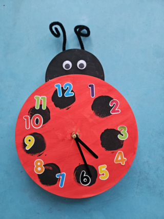 Pendule coccinelle - 10doigts.fr