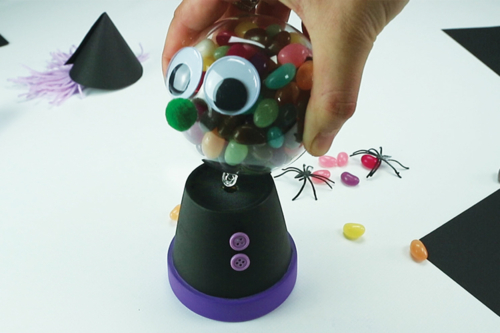 Sorcière distributeur de bonbons